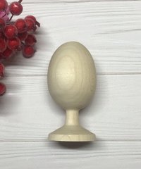 Яйце дерев'яне на підставці